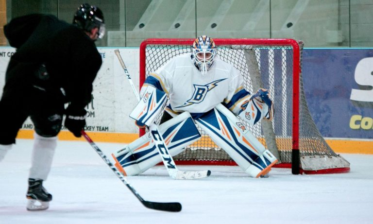 Hockey, puck shot on goal