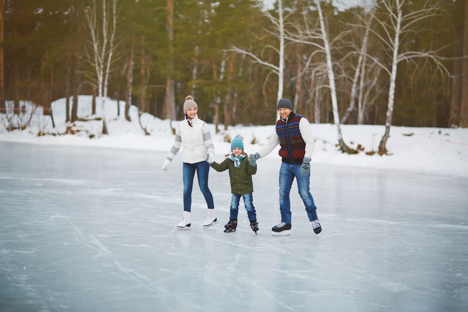 Family skating at the ice rink